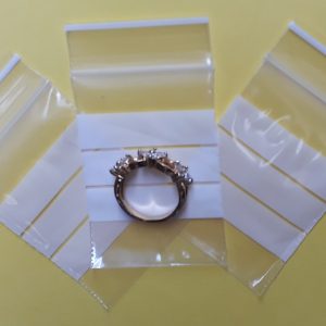SZT01- Saquinho Plástico ZIP com Tarja 4x5cm - Pacote com 100 unidades