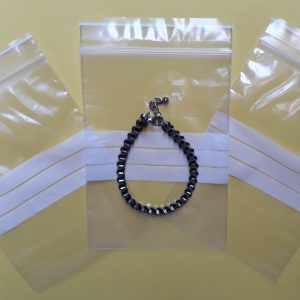 SZT04 - Saquinho Plástico ZIP com Tarja 9x12cm - Pacote com 100 unidades